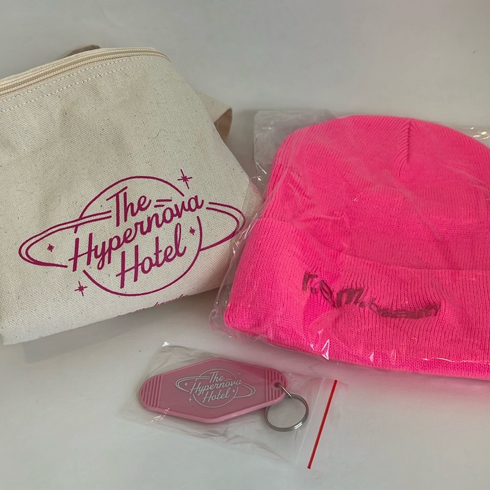 r.e.m. beauty The Hypernova Hotel duffle bag, beanie, and key chain